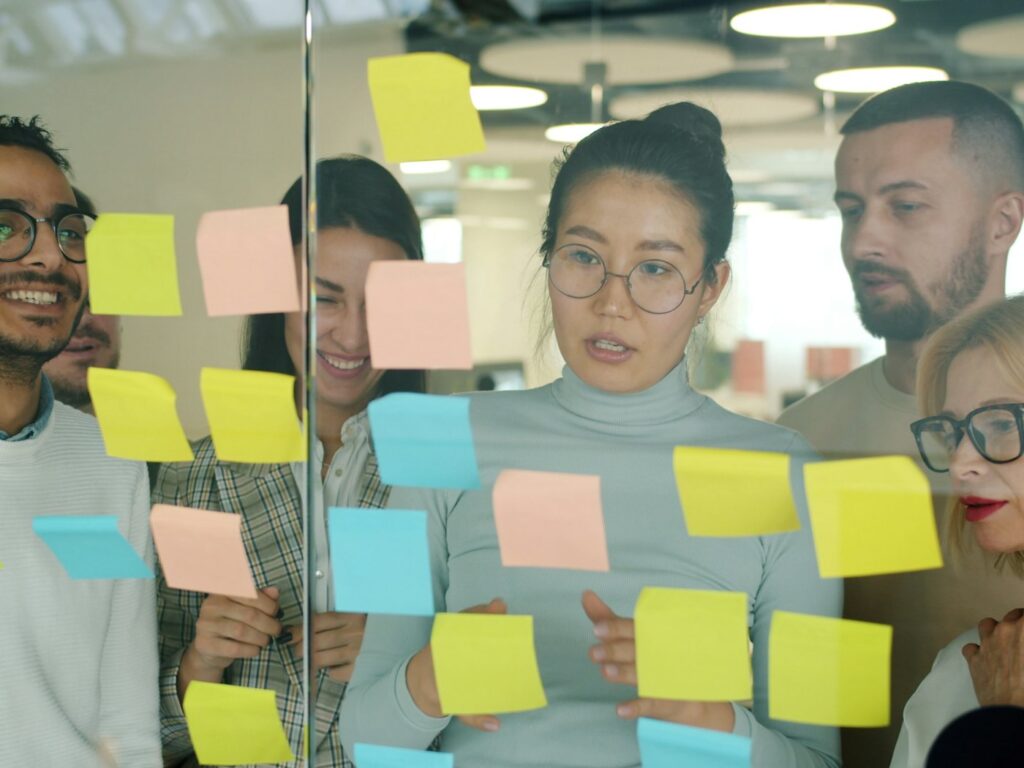 Team brainstorming with colorful sticky notes